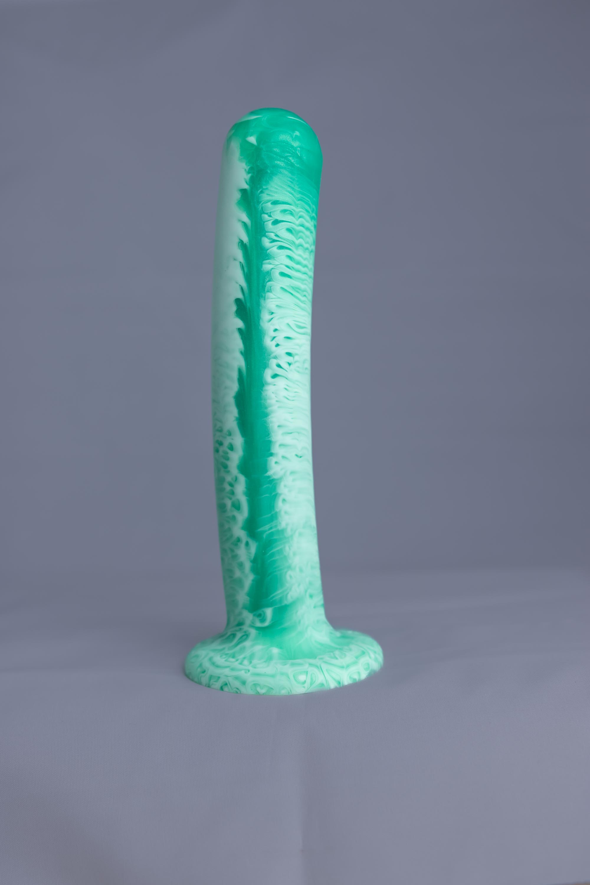 Arc'o – gode en silicone – vue de face – couleur vert et blanc marbré